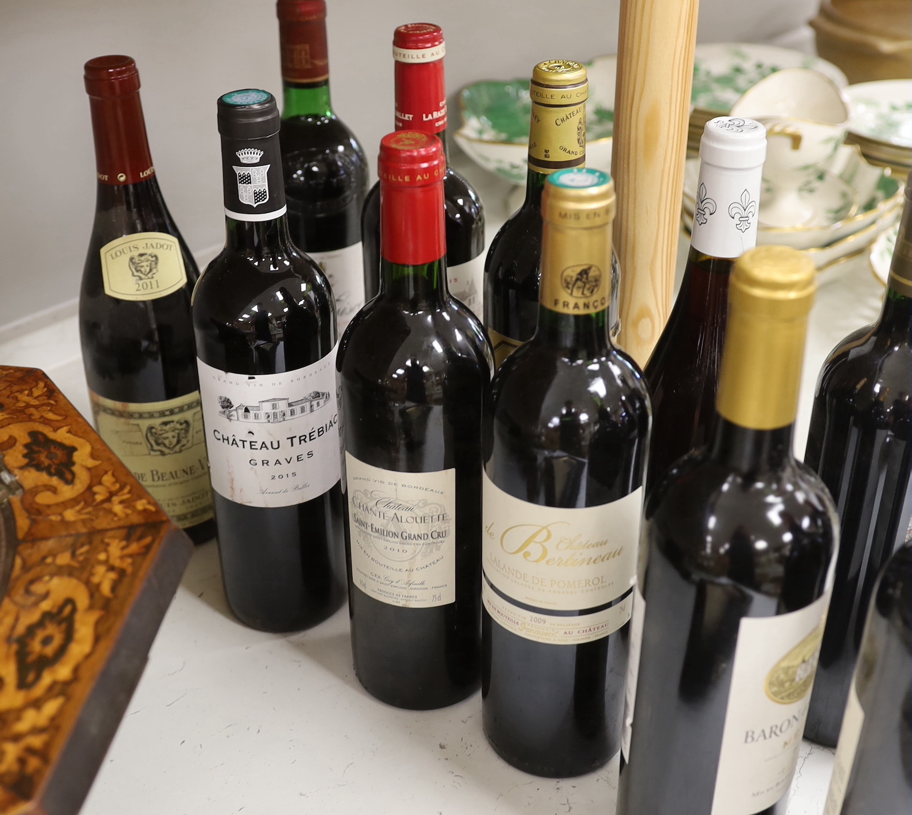 Twelve bottles of wine including Margaux Chateau Giscours 1975, Margaux Chateau Deyrem Valentin 2017, Saint Emilion Chateau Chante Alouette 2010 Grand Cru, Saint Emilion Chateau Villemaurine 2010 Grand Cru